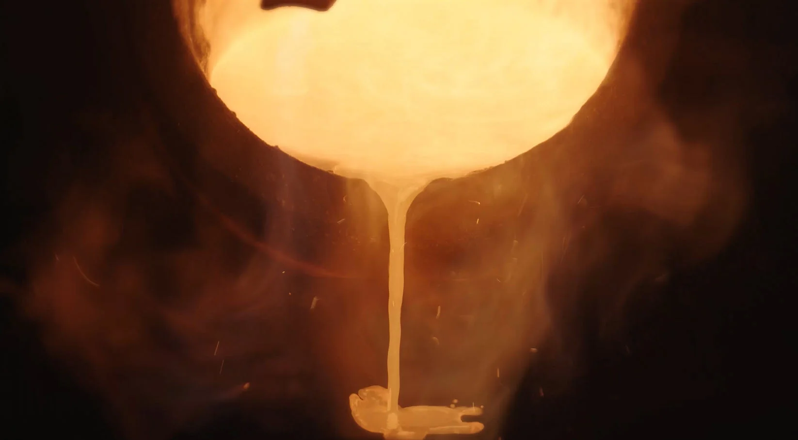 Molten gold poured by a goldsmith